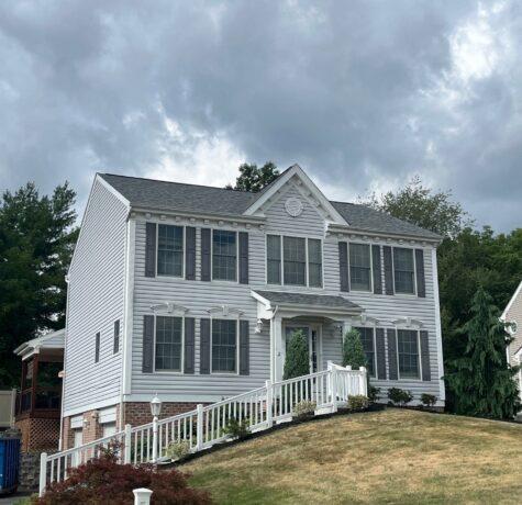 gray house with new roof