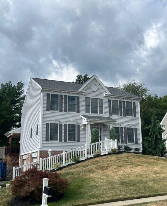 gray house with new roof