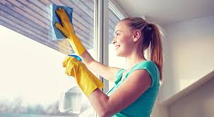 woman cleaning windows