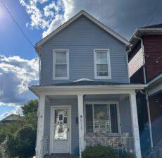 shotgun house with new roof and siding