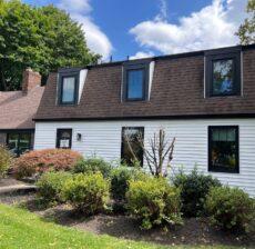 New siding and a rock siding feature