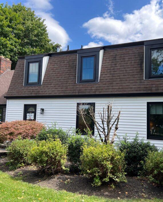 New siding and a rock siding feature