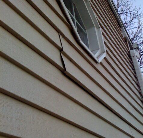 loose vinyl siding