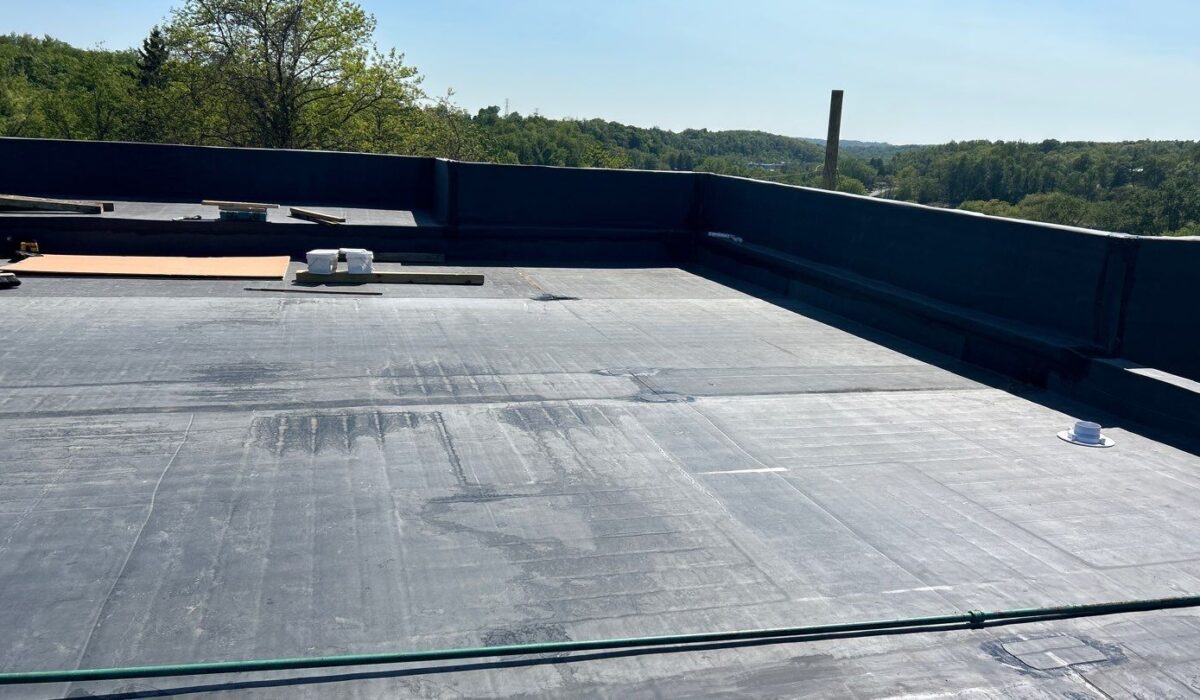 Flat Roof Maintenance Guide How Roof Coating Extends Roof Life and Prevents Costly Repairs